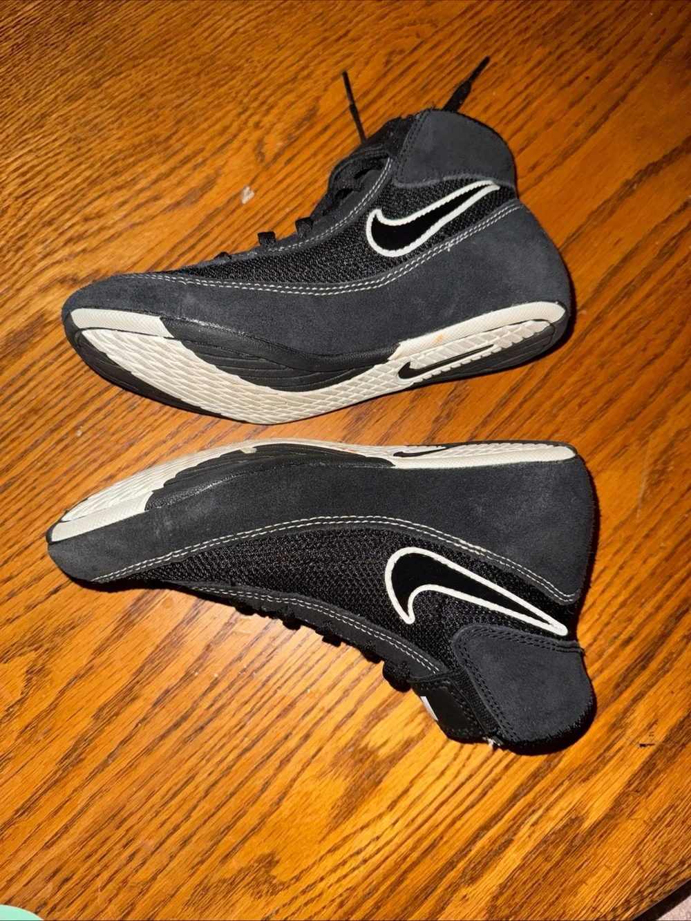 Nike Kids Black High-Top Sneakers with White Swoosh